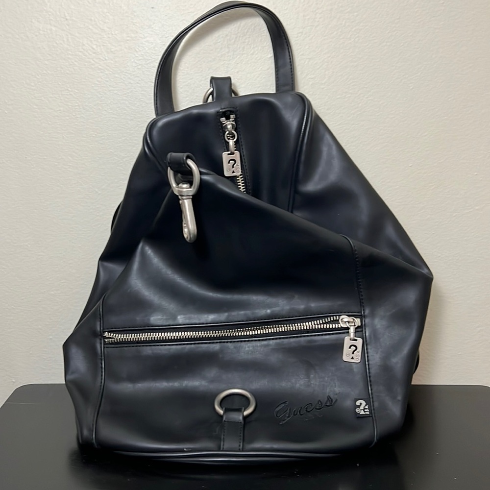 Guess - Black bag - Used Condition

*Tears, see photo.